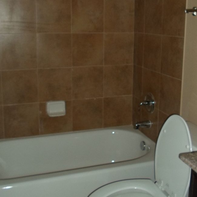 Pine-Ridge-Manor-Crockett-TX-bathroom-with-granite-counters