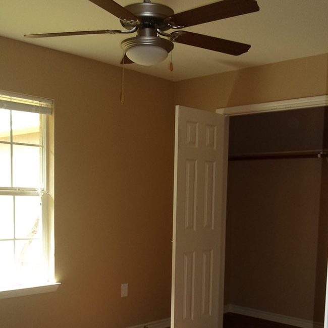 Pine-Ridge-Manor-Crockett-TX-bedroom-with-walk-in-closet